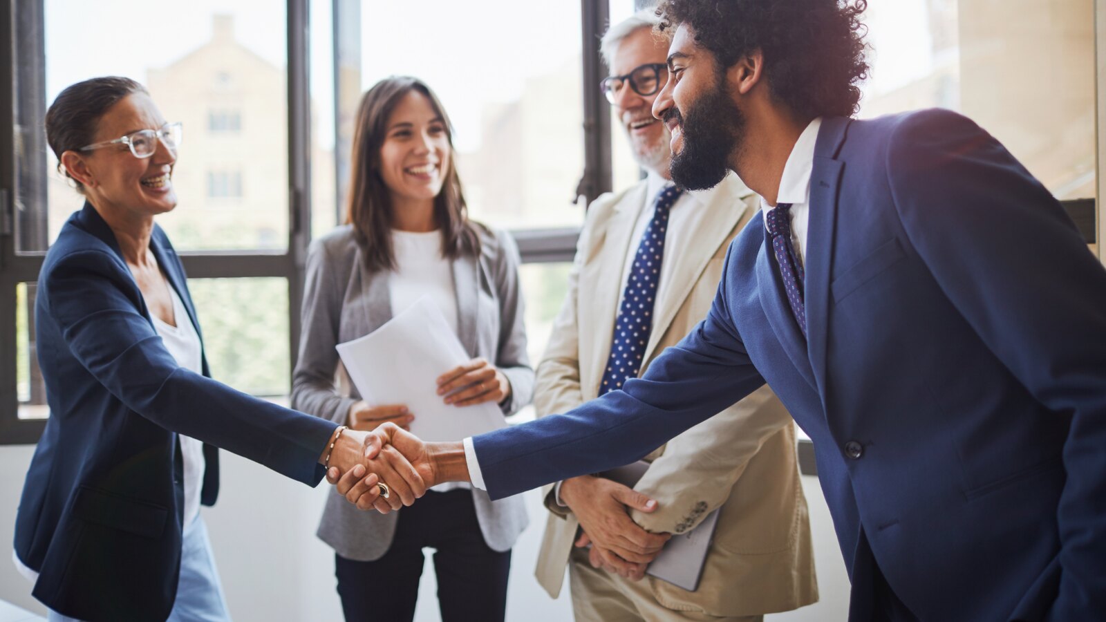 CTA team members shaking hands